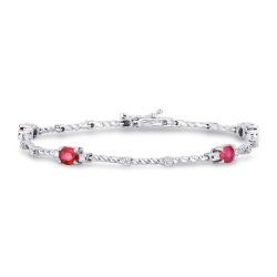 Alternate bracelet in white gold 18k with diamonds and 4 rubies oval cut