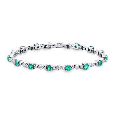 Alternate bracelet with emeralds and round cut diamonds