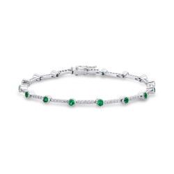 Segment bracelet with emeralds and diamonds