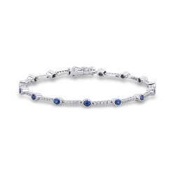 Segment bracelet with sapphires and round cut diamonds