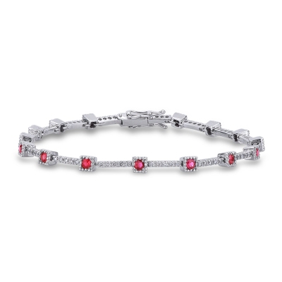 Alternate bracelet with rubies settend on square bezel and diamonds