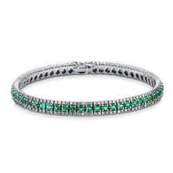 Fancy tennis bracelet with diamonds and emeralds