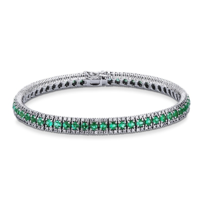 Fancy tennis bracelet with diamonds and emeralds
