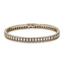 Fancy 18k yellow gold tennis bracelet with diamonds