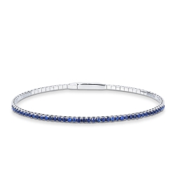 Bracciale rigido tennis con zaffiri blu in oro bianco 18k