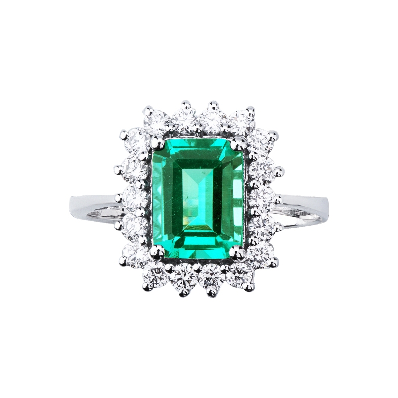ANELLO CONTORNO CON 18BRILLANTI E SMERALDO RETTANGOLARE MM8X6