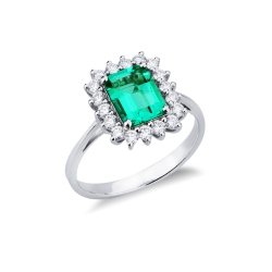 ANELLO CONTORNO CON 18BRILLANTI E SMERALDO RETTANGOLARE MM8X6