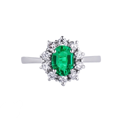 ANELLO CONTORNO CON 10BRILLANTI E SMERALDO OVALE MM7X5 CIRCA