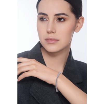 Bracciale design tessuto in oro bianco 18k con diamanti