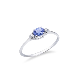 White gold 18k ring with central tanzanite and two lateral diamonds 