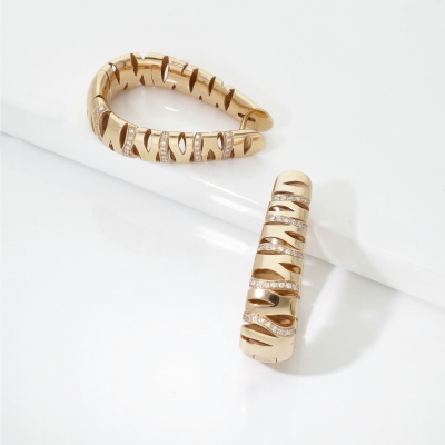 Orecchini in oro rosa 750 con striature e diamanti