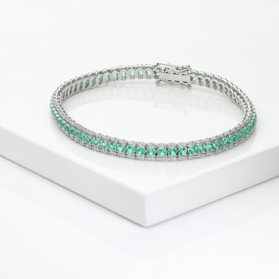 BRACCIALE TIPO TENNIS A 3 FILE CON BRILLANTI E SMERALDI. LARGH.5.00MM 