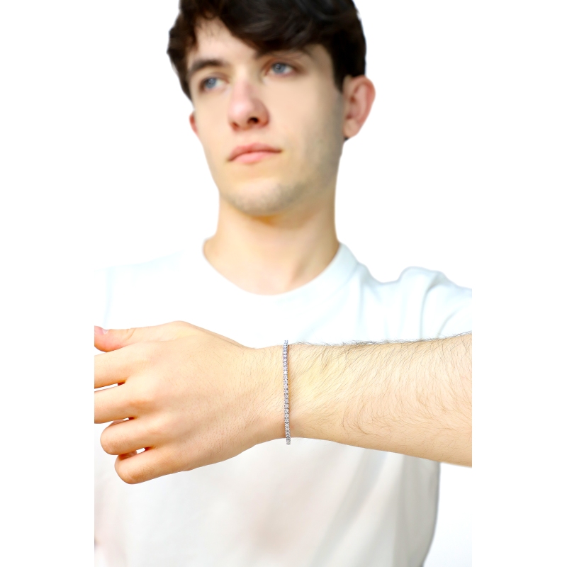 Tennis griffe elastico con diamanti in oro bianco 750