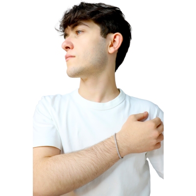 Bracciale tennis elastico in oro bianco 750 con diamanti