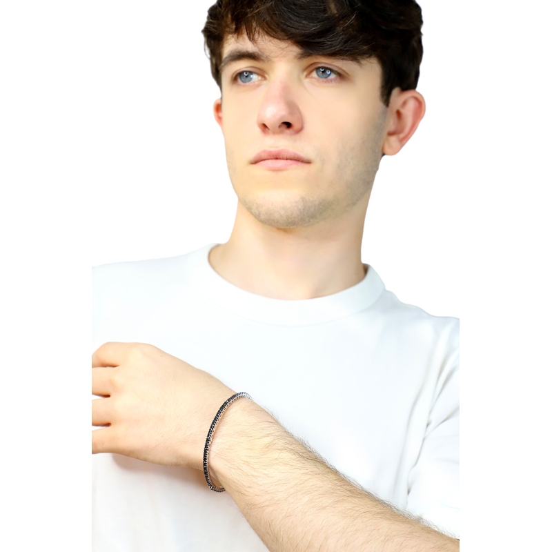 Bracciale tennis elastico in oro bianco 18k con diamanti neri