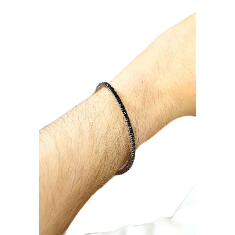 Bracciale tennis elastico in oro bianco 18k con diamanti neri
