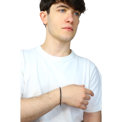 Bracciale tennis griffe elastico con diamanti neri in oro bianco 18k