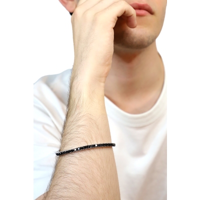 Bracciale tennis elastico con diamanti neri in oro bianco 18k