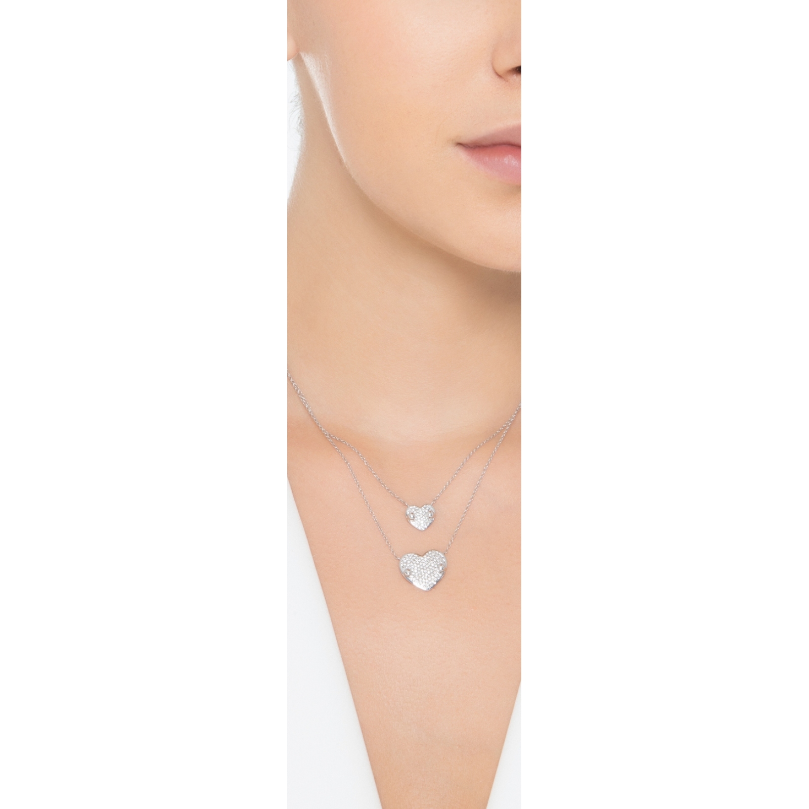 Collana in oro bianco 18k con cuore in pavé brunito di diamanti e rubini | GV Collana in oro bianco 18k con cuore in pavé brunito di diamanti e rubini | GV