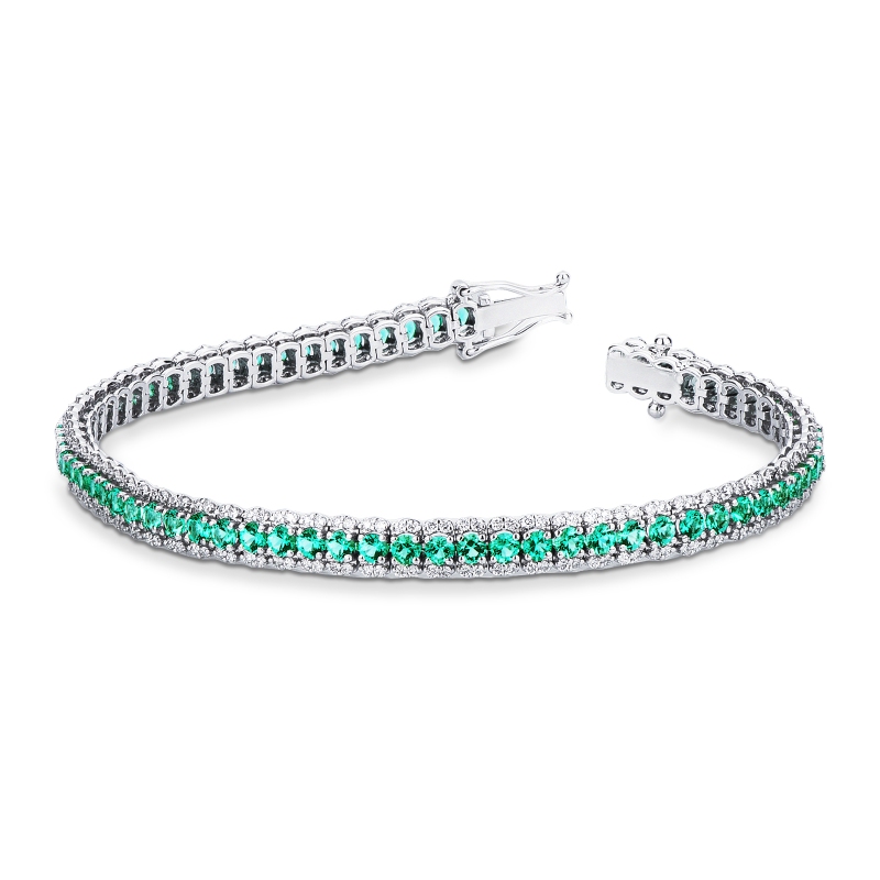 BRACCIALE TIPO TENNIS A 3 FILE CON BRILLANTI E SMERALDI. LARGH.5.00MM 