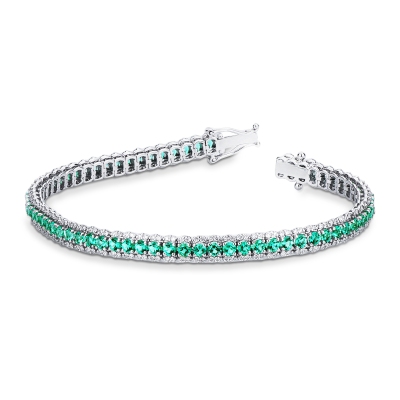 BRACCIALE TIPO TENNIS A 3 FILE CON BRILLANTI E SMERALDI. LARGH.5.00MM 