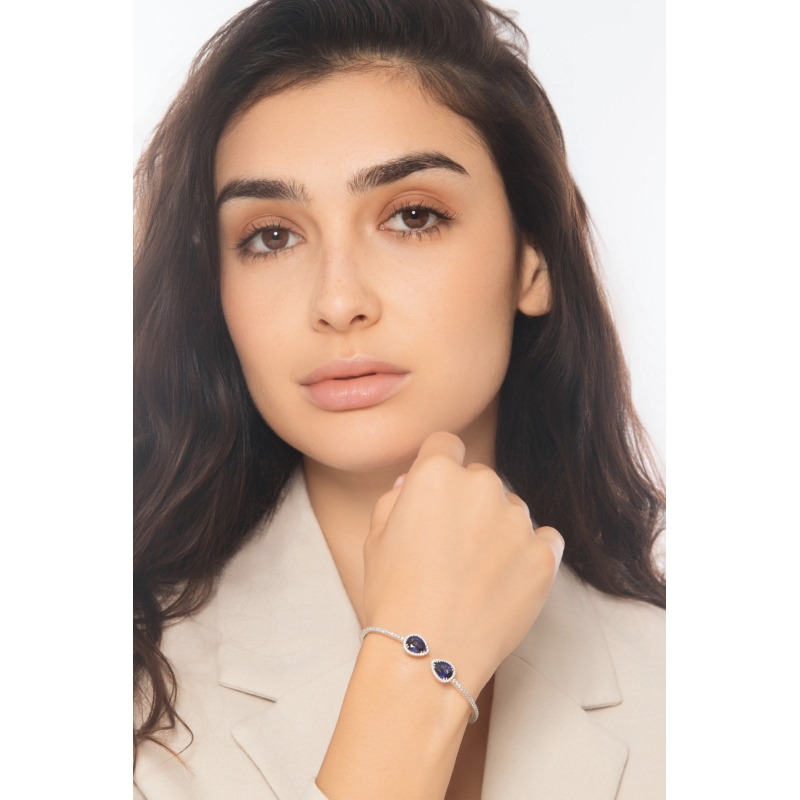 18k white gold spring bracelet with blue sapphires pear cut and diamonds 