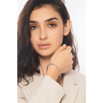 Bracciale tennis elastico in oro bianco 750 con diamanti