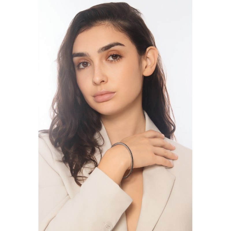 Bracciale tennis elastico in oro bianco 18k con diamanti neri