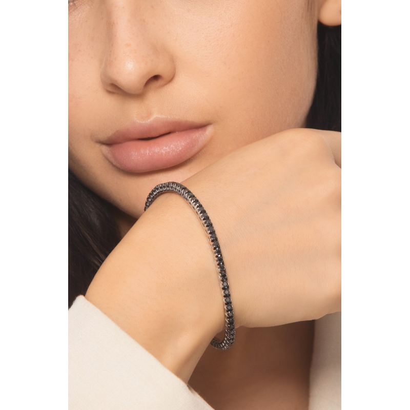 Bracciale tennis elastico in oro bianco 18k con diamanti neri
