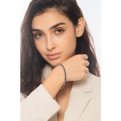 Bracciale tennis elastico con diamanti neri in oro bianco 18k