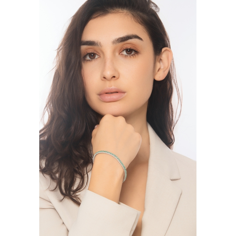 BRACCIALE TIPO TENNIS A 3 FILE CON BRILLANTI E SMERALDI. LARGH.5.00MM 