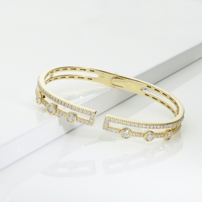 Bracciale semirigido in oro giallo 18k con diamanti