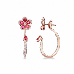 Orecchini design pendenti in oro rosa 18k con fiore in rubini e diamanti
