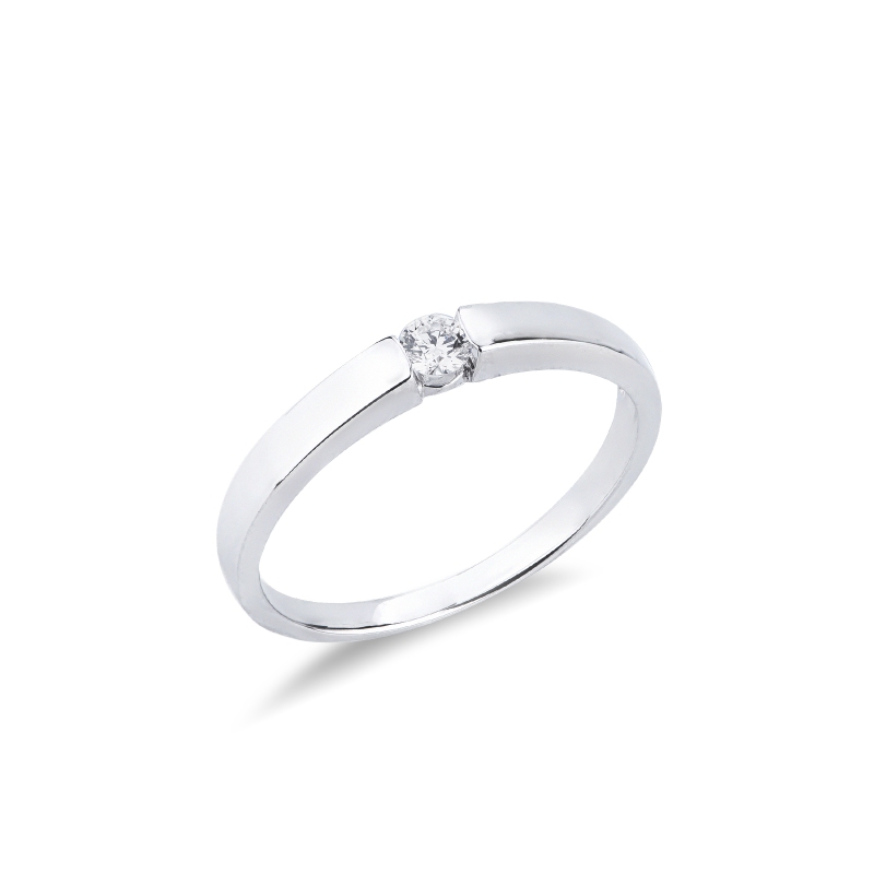 Solitario in oro bianco 18k e diamante da 0.10 ct. Incastonatura a battuto