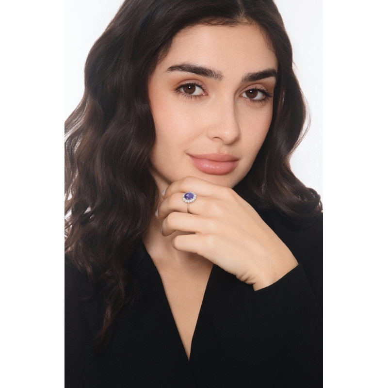 ANELLO CONTORNO CON 14BRILLANTI E TANZANITE OVALE MM9X7