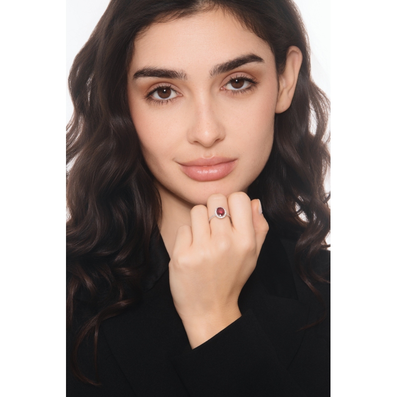 18k white gold halo ring with oval cut ruby and diamonds halo and shoulder set