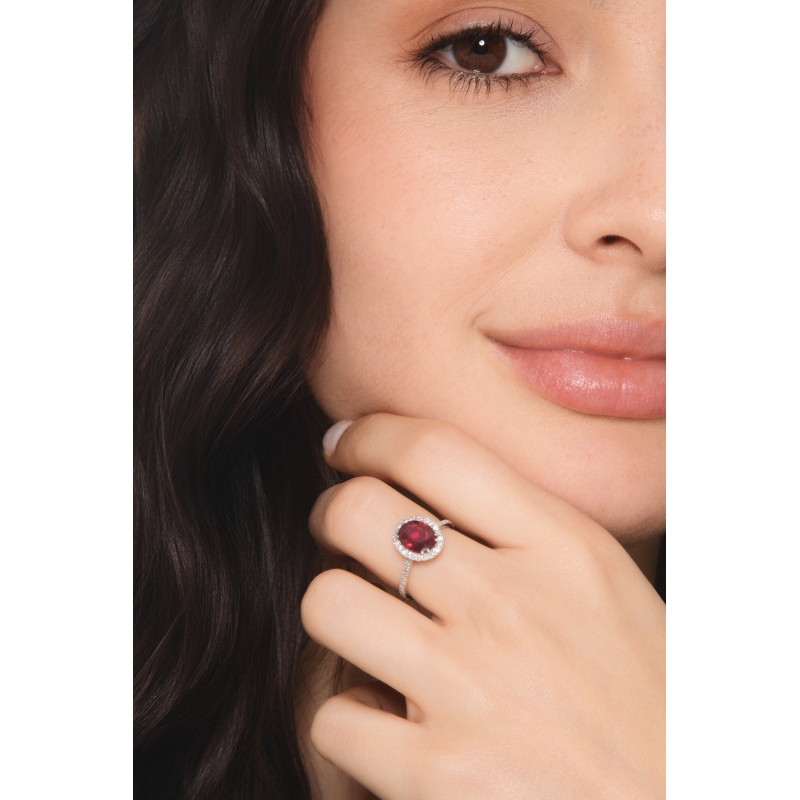 18k white gold halo ring with oval cut ruby and diamonds halo and shoulder set