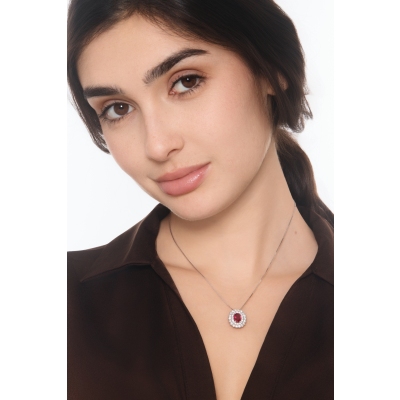 Double halo neacklace in white gold 18k with central ruby oval cut and diamonds 