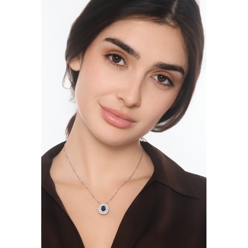18k white gold double halo necklace with central blue sapphire and diamonds 
