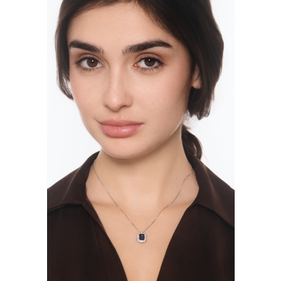 Necklace with pendant, central emerald cut blue sapphire cowned by diamonds