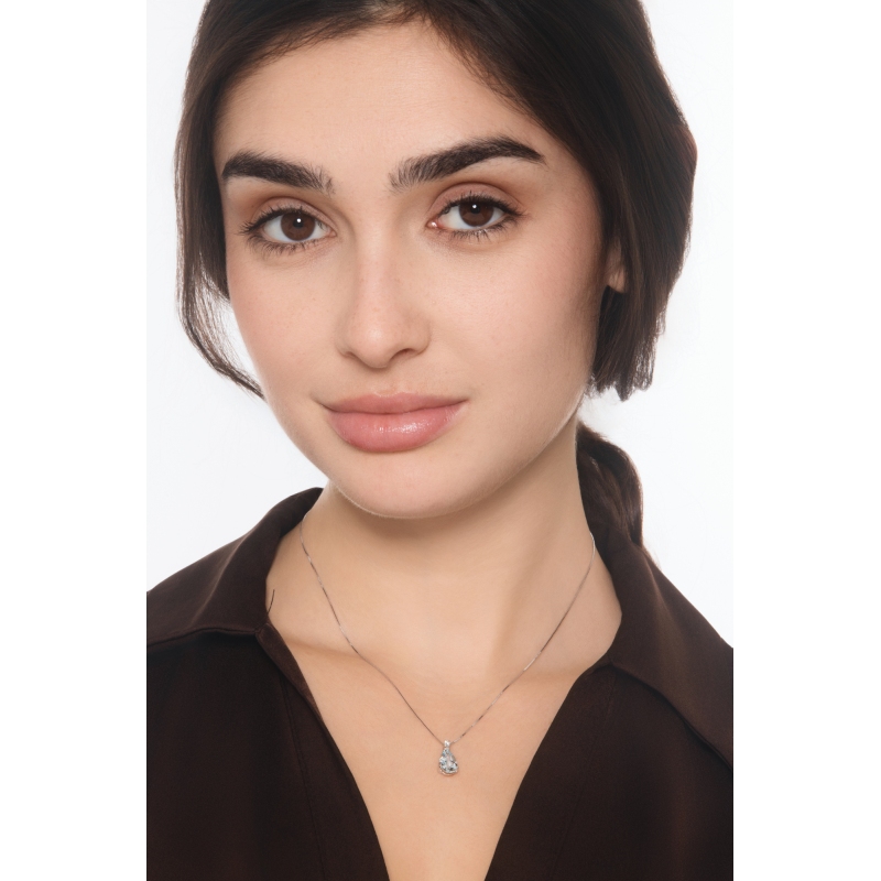 18k white gold necklace with diamond and pear cut aquamarine pendant