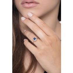 White gold 18k halo ring with diamonds and central blue sapphire  2