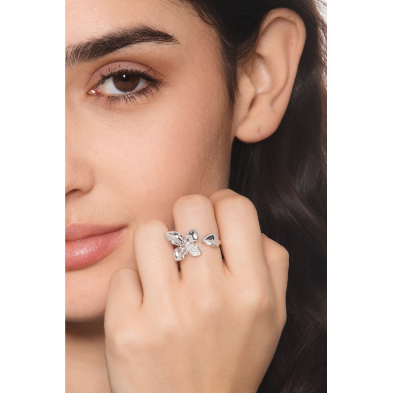 Anello aperto con fiore e diamanti in oro bianco 18k