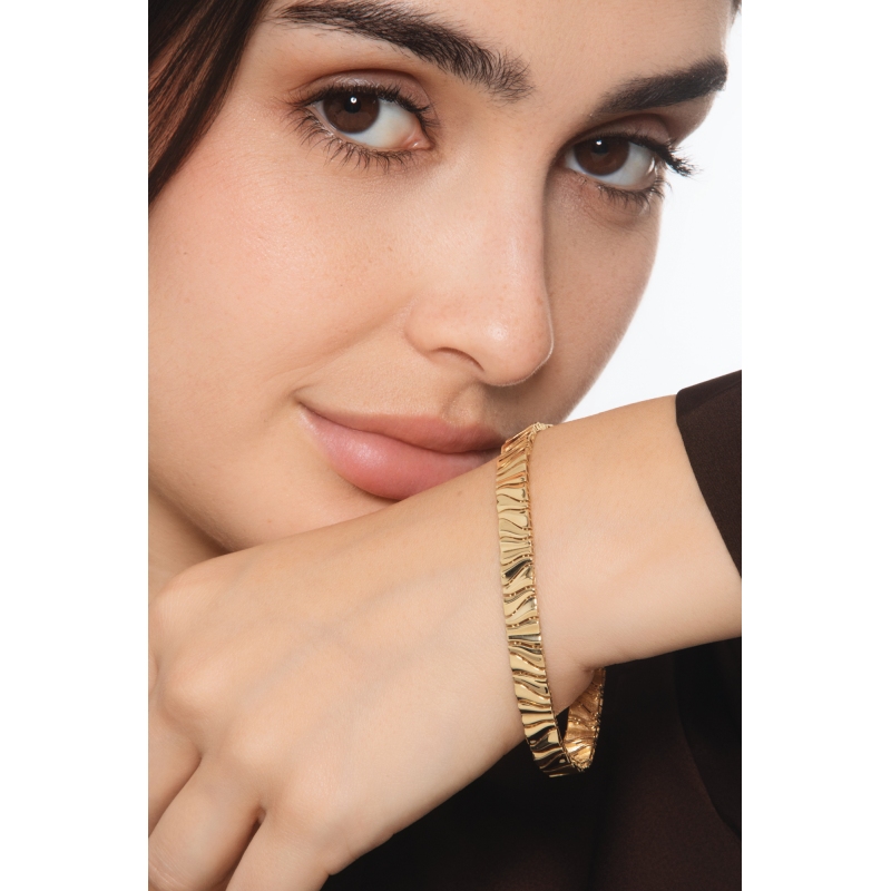 Bracciale in oro giallo 18k ondulato a specchio lucido