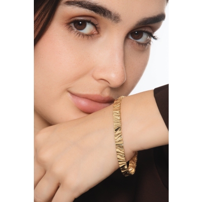 Bracciale in oro giallo 18k ondulato a specchio lucido