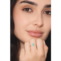 ANELLO CONTORNO CON 12BRILLANTI E SMERALDO OVALE MM5X4 2