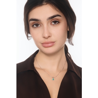 Collana contorno in oro bianco 18k con smeraldo ovale e diamanti 