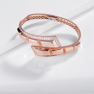Bracciale semirigido a molla in oro rosa 750 e diamanti