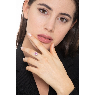 Halo ring with oval cut pink sapphire and diamonds in white gold 18k 