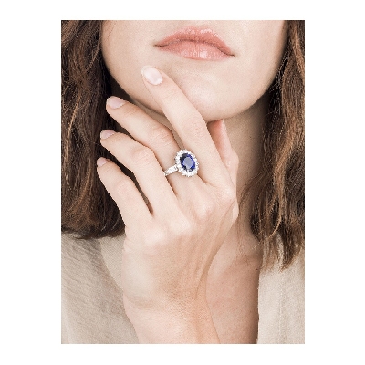 Halo ring white gold 18k with diamonds and blue sapphire
